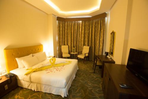 Imagen de la habitación del Hotel Green Garden, Doha. Foto 6