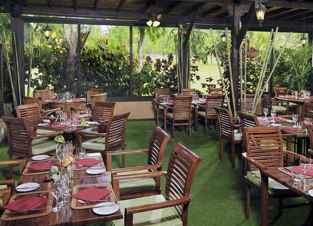 Imagen del bar/restaurante del Hotel Green Garden Eco Resort and Villas. Foto 5