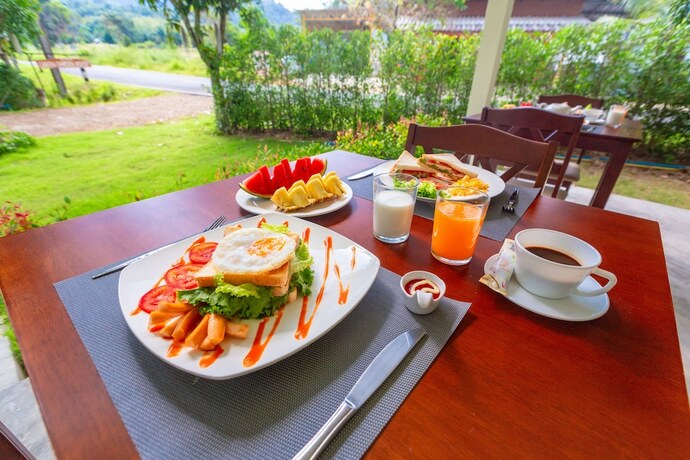 Imagen del bar/restaurante del Hotel Green Garden House. Foto 17