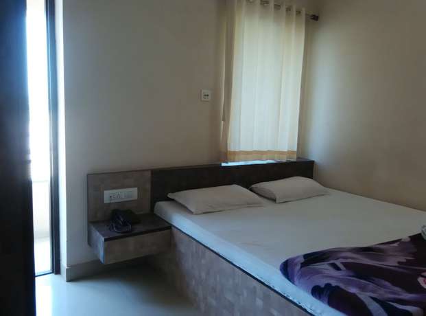 Imagen de la habitación del Hotel Green Gate Digha. Foto 11