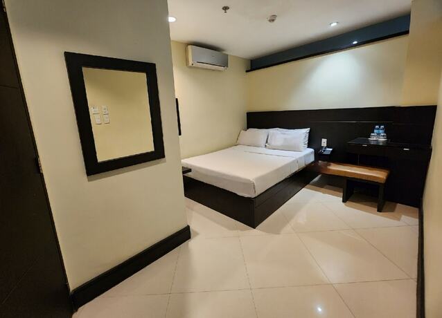 Imagen de la habitación del Hotel Green Glass, Calamba. Foto 10