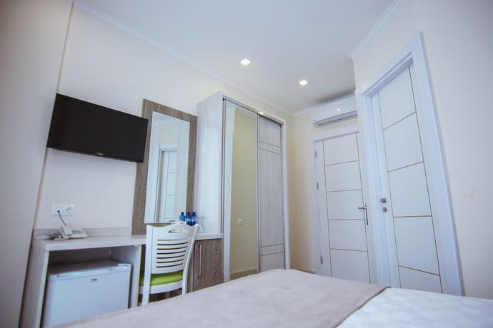 Imagen de la habitación del Hotel Green Glass. Foto 2