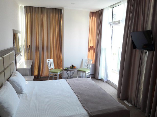 Imagen de la habitación del Hotel Green Glass. Foto 7