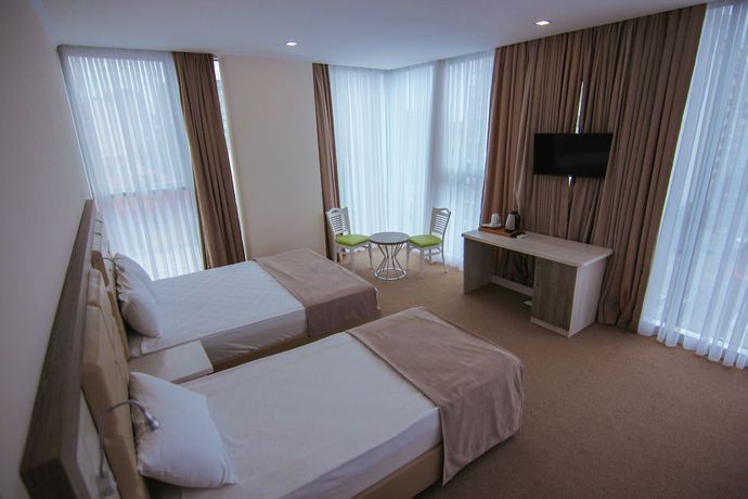 Imagen de la habitación del Hotel Green Glass. Foto 10