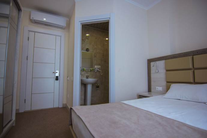 Imagen de la habitación del Hotel Green Glass. Foto 13