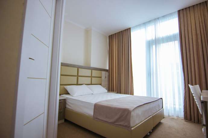 Imagen de la habitación del Hotel Green Glass. Foto 16