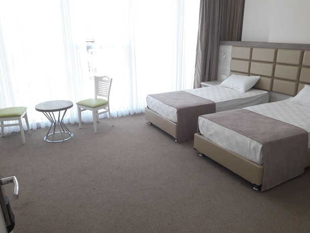 Imagen de la habitación del Hotel Green Glass. Foto 19