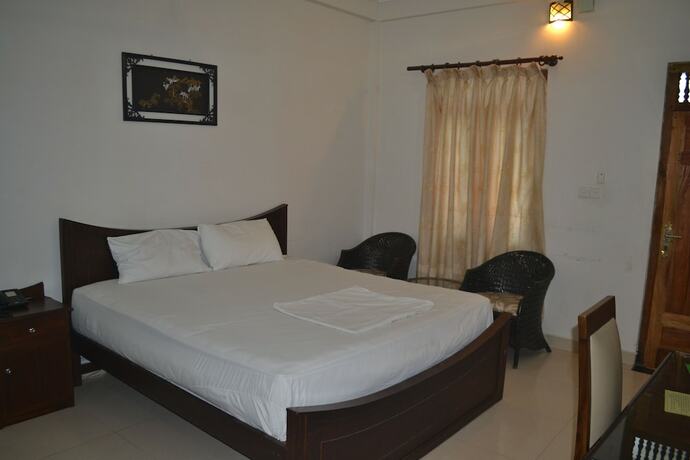 Imagen de la habitación del Hotel Green Grass. Foto 15
