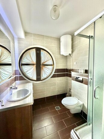 Imagen de la habitación del Hotel Green Hill Apartment. Foto 19