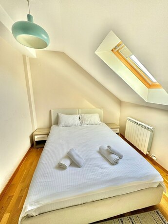 Imagen de la habitación del Hotel Green Hill Apartment. Foto 21