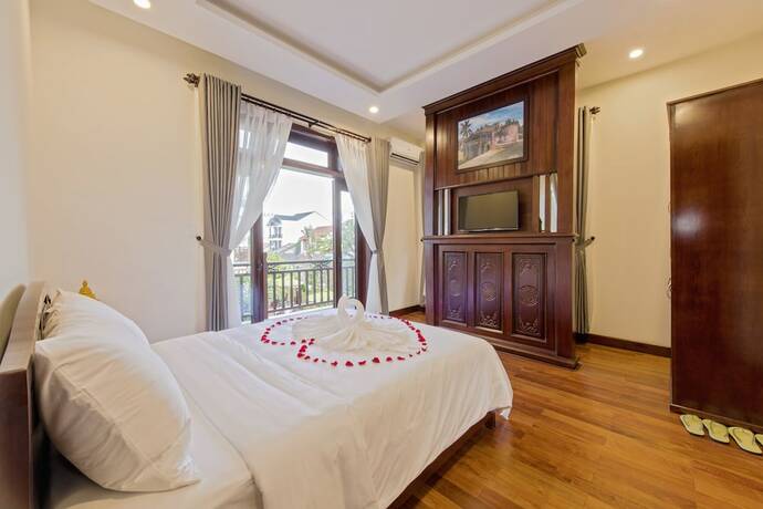 Imagen de la habitación del Hotel Green Hill Villa. Foto 15