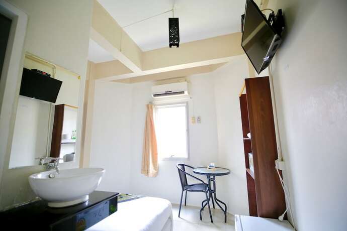 Imagen de la habitación del Hotel Green House Bangkok, Bangkok. Foto 11