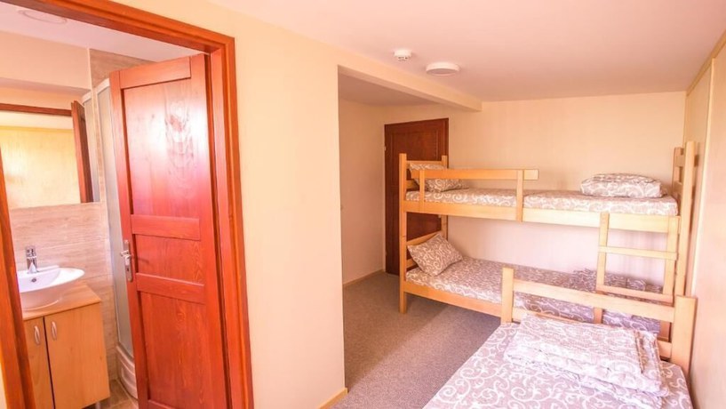 Imagen de la habitación del Hotel Green House Hostel. Foto 6