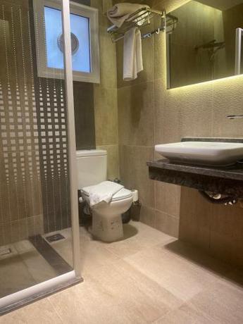 Imagen de la habitación del Hotel Green House, Suez. Foto 16