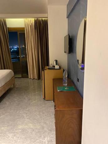 Imagen de la habitación del Hotel Green House, Suez. Foto 17
