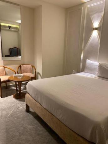 Imagen de la habitación del Hotel Green House, Suez. Foto 18