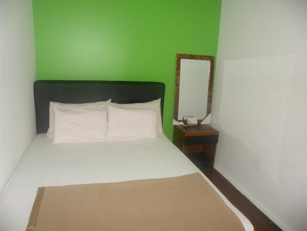 Imagen de la habitación del Hotel Green Hut Lodge. Foto 6