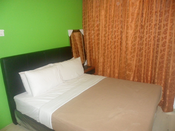 Imagen de la habitación del Hotel Green Hut Lodge. Foto 8