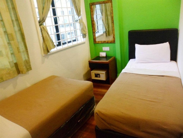Imagen de la habitación del Hotel Green Hut Lodge. Foto 11