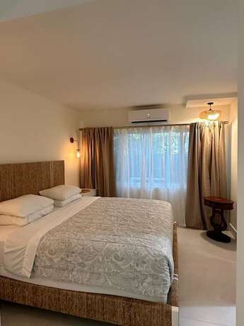 Imagen de la habitación del Hotel Green Island Inn. Foto 15