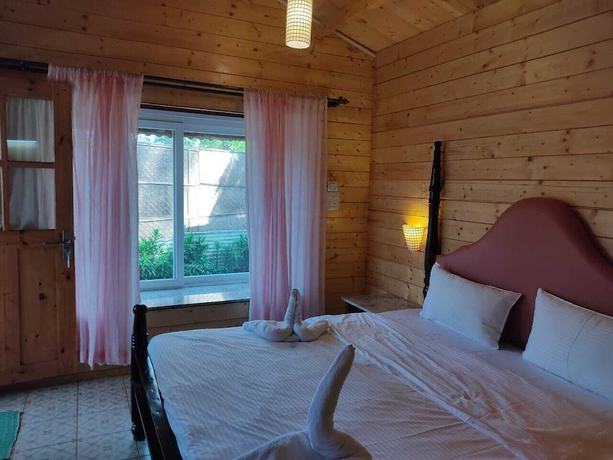 Imagen de la habitación del Hotel Green Ivy Resort. Foto 4