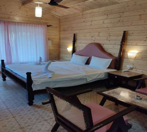 Imagen de la habitación del Hotel Green Ivy Resort. Foto 8