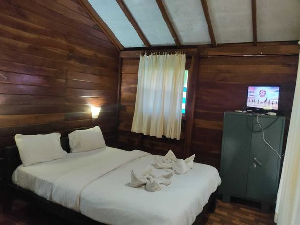 Imagen de la habitación del Hotel Green Ivy Resort. Foto 11