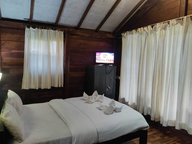 Imagen de la habitación del Hotel Green Ivy Resort. Foto 12