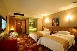 Imagen de la habitación del Hotel Green Land Hotel. Foto 4