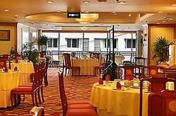 Imagen del bar/restaurante del Hotel Green Land Hotel. Foto 2