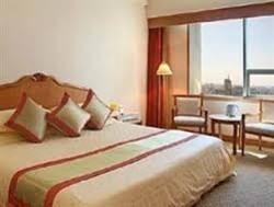 Imagen de la habitación del Hotel Green Land, Kunming. Foto 3