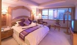 Imagen de la habitación del Hotel Green Land, Kunming. Foto 4