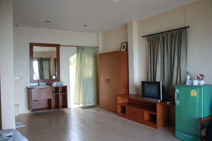 Imagen de la habitación del Hotel Green Lay Resort. Foto 12