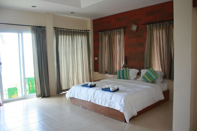 Imagen de la habitación del Hotel Green Lay Resort. Foto 18