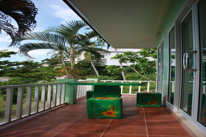 Imagen de la habitación del Hotel Green Lay Resort. Foto 20