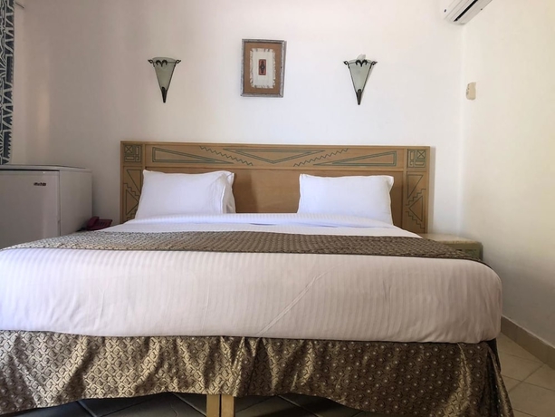 Imagen de la habitación del Hotel Green Leaves Aqua Park Beach Resort North Coast. Foto 4
