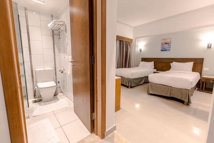 Imagen de la habitación del Hotel Green Leaves Aqua Park Beach Resort North Coast. Foto 8