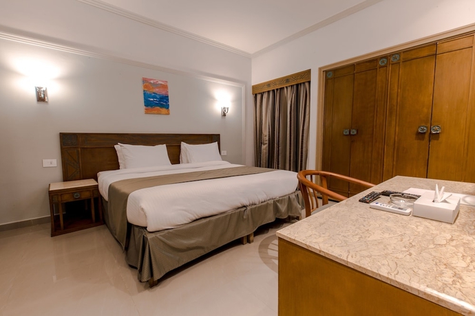 Imagen de la habitación del Hotel Green Leaves Aqua Park Beach Resort North Coast. Foto 9