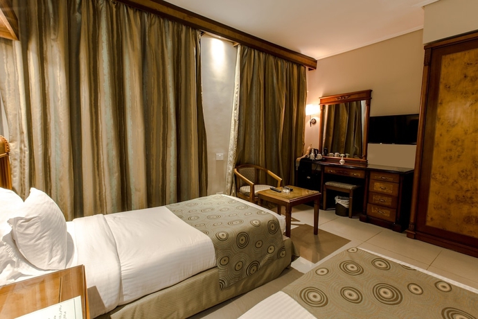 Imagen de la habitación del Hotel Green Leaves Aqua Park Beach Resort North Coast. Foto 15