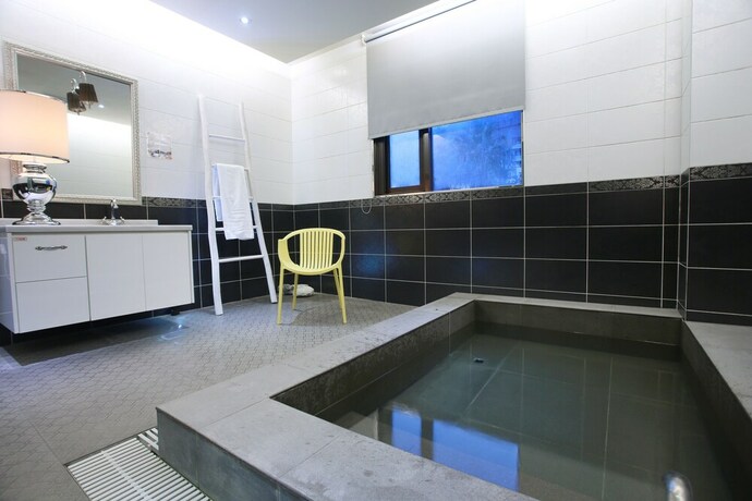 Imagen de la habitación del Hotel Green Life Spa Hot Spring Hotel. Foto 19