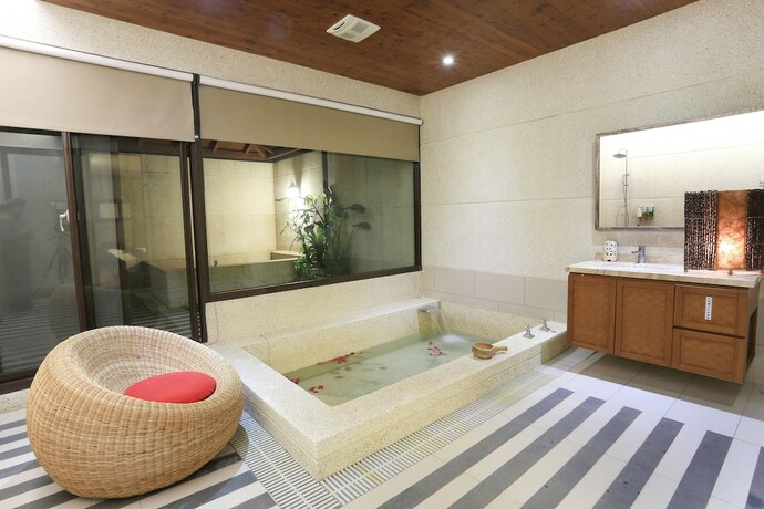 Imagen de la habitación del Hotel Green Life Spa Hot Spring Hotel. Foto 26