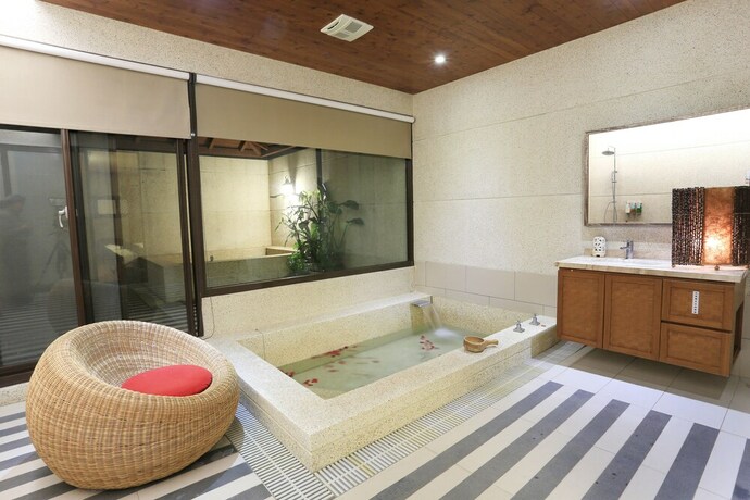 Imagen de la habitación del Hotel Green Life Spa Hot Spring Hotel. Foto 32