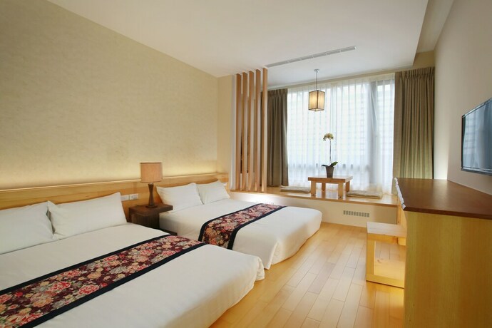 Imagen de la habitación del Hotel Green Life Spa Hot Spring Hotel. Foto 34