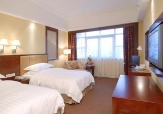 Imagen de la habitación del Hotel Green Lotus. Foto 2