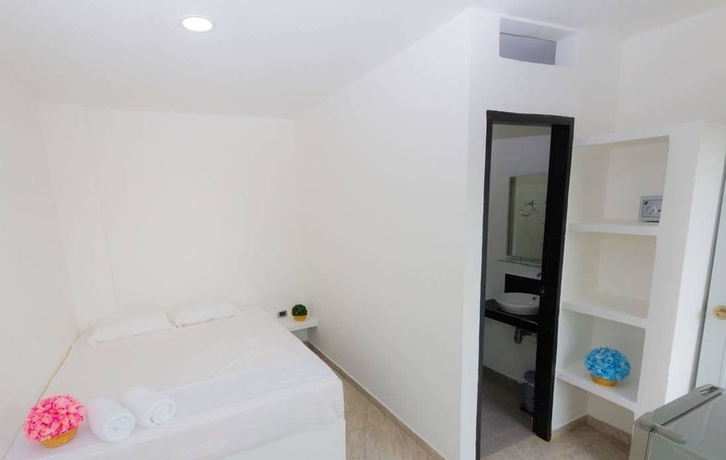 Imagen de la habitación del Hotel Green Luxury. Foto 4