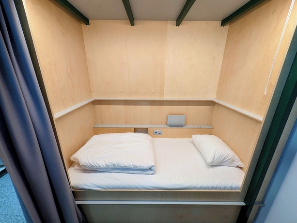 Imagen de la habitación del Hotel Green Marmot Capsule Geneva. Foto 6