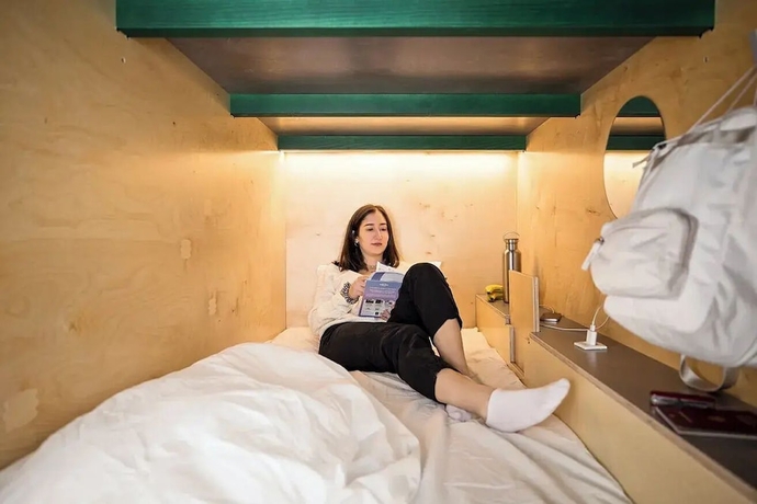 Imagen de la habitación del Hotel Green Marmot Capsule Geneva. Foto 10