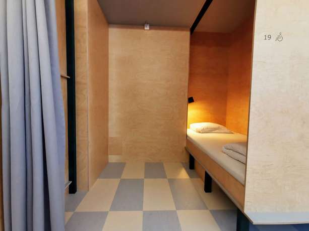 Imagen de la habitación del Hotel Green Marmot Capsule Zurich. Foto 18