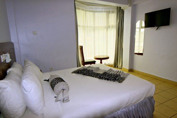 Imagen de la habitación del Hotel Green Mountain, ARUSHA. Foto 5