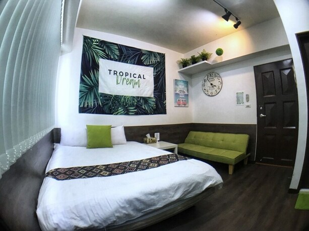Imagen de la habitación del Hotel Green Mu. Foto 22